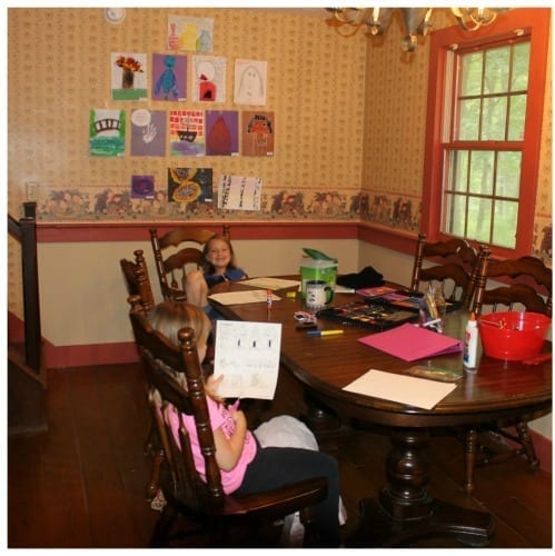 log cabin dining room with old wall paper