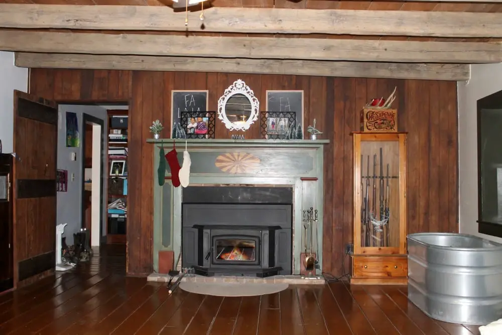 Real wood paneling in living room.