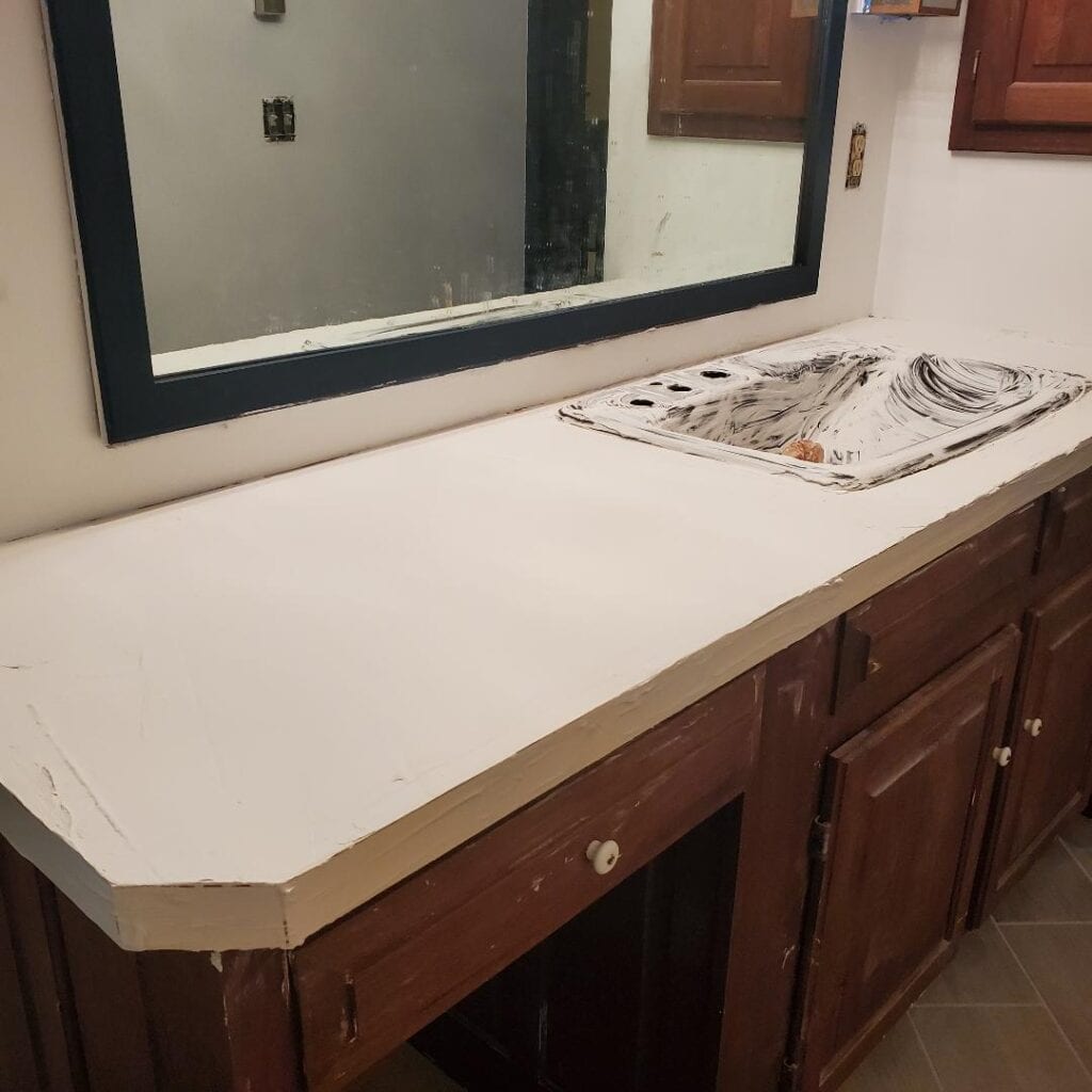 First layer of Ardex feather finish concrete on my laminate countertops.