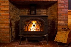 how to heat a wood stove with a log cabin