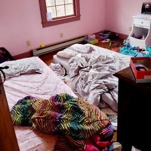 cluttered kids bedroom