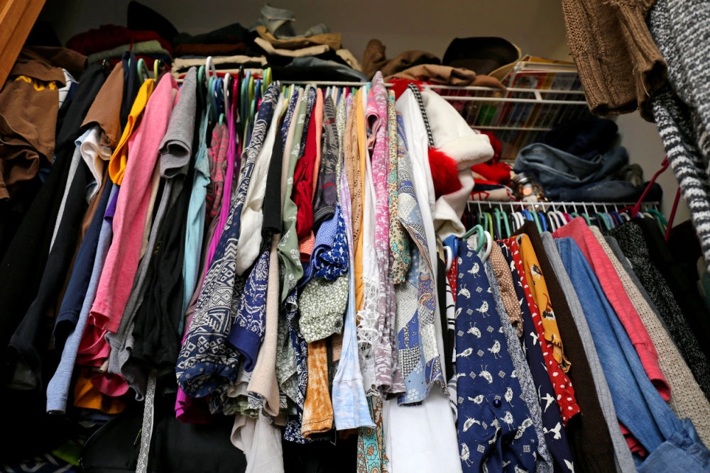 If you've recently decluttered your closet you're probably left with a stack of hangers. Here's where to donate old clothes hangers and what else you can do with them.