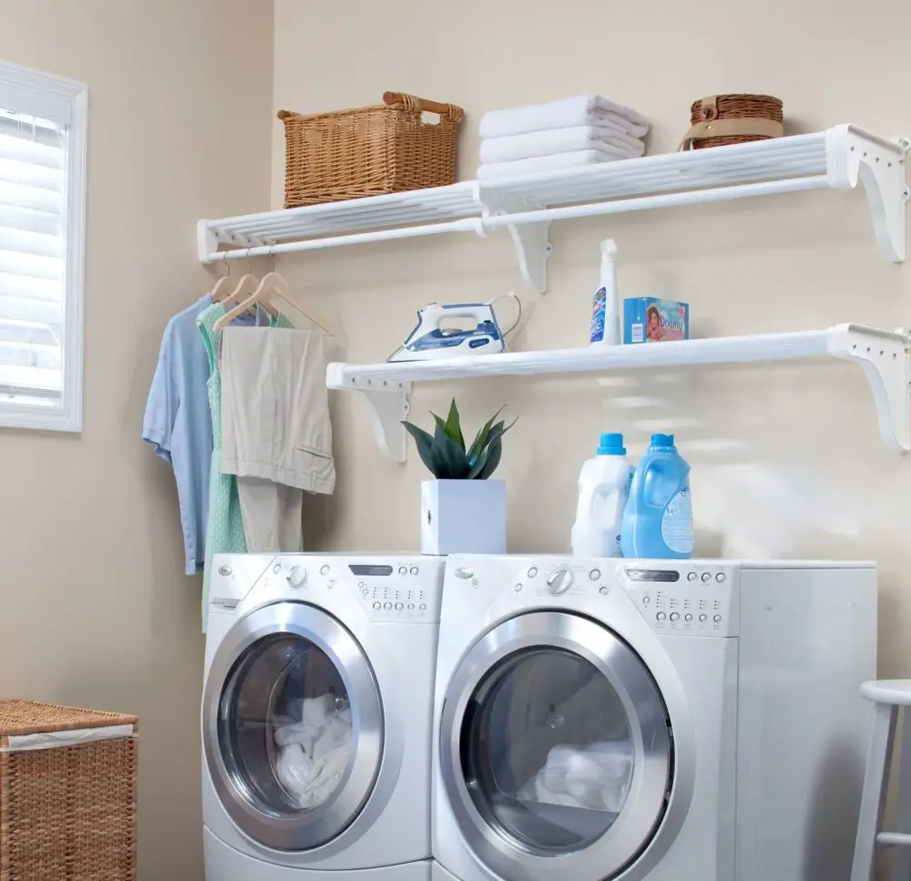 How to organize your small laundry room - add shelves or cabinets over your washer and dryer