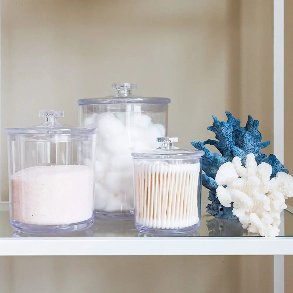 Organize your laundry supplies in glass containers.