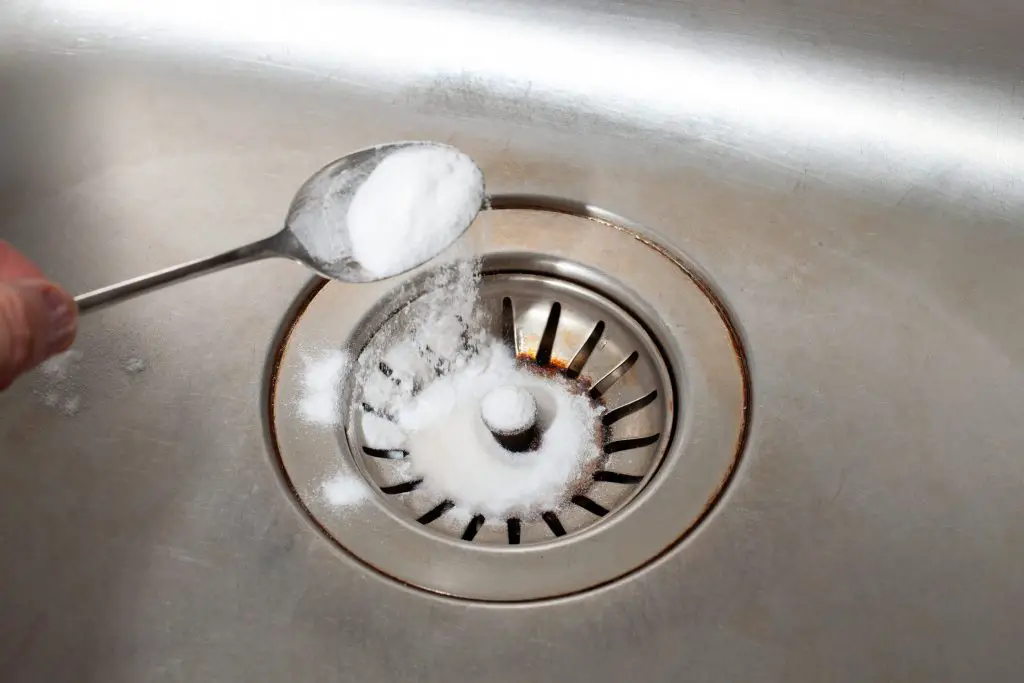 Clean your sink drain with baking soda and vinegar.