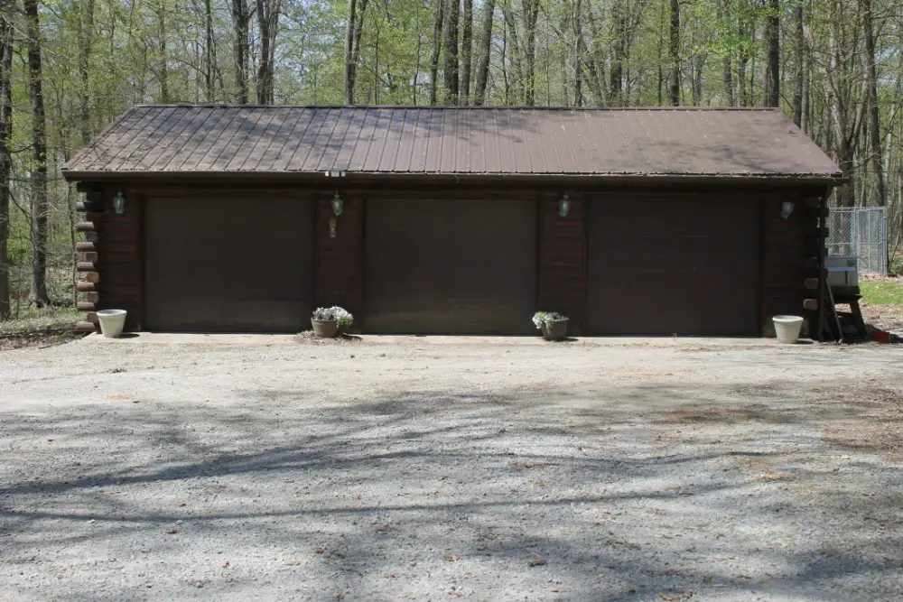 A standard three car log cabin garage without living quarters.