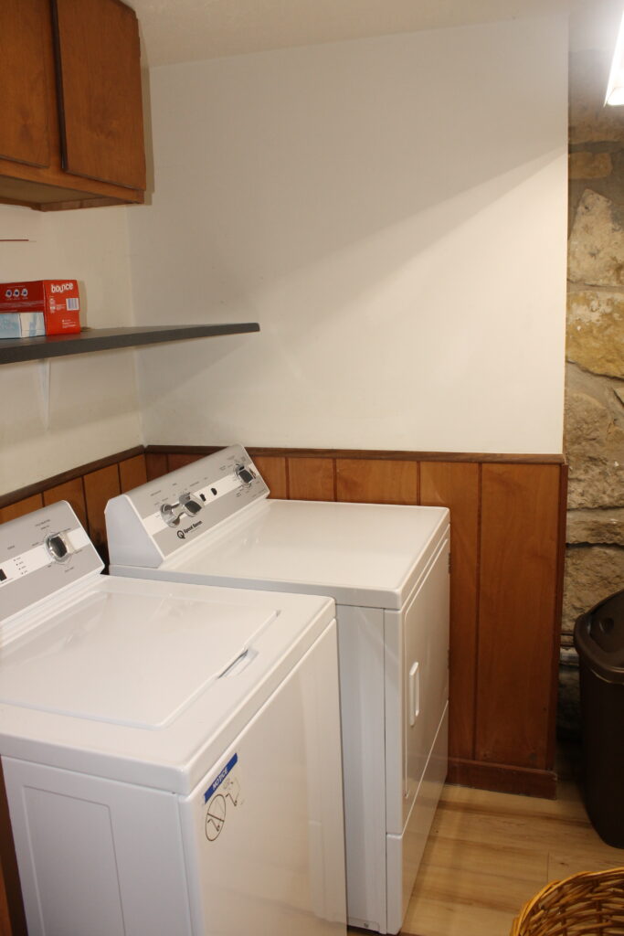 Speed Queen washer and dryer in a laundry room